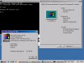 Desktop with System Properties, About Windows, and Command Prompt in German